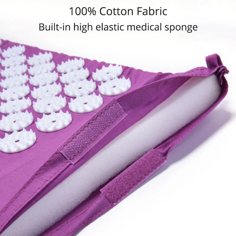 Purple acupressure mat with white nodes on a white background, featuring text about cotton fabric and medical sponge.